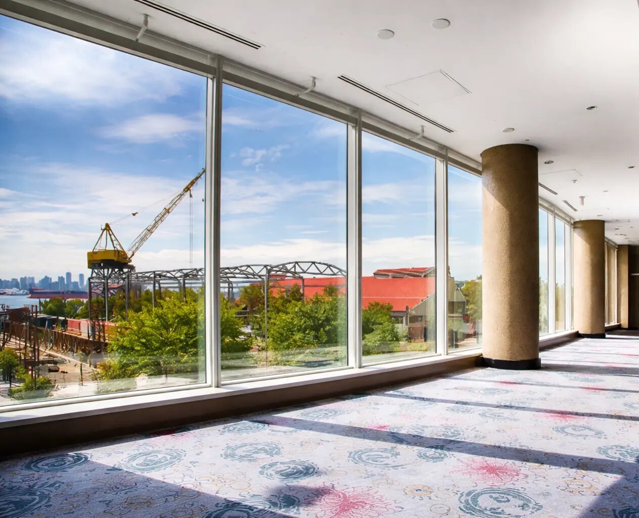 Ballroom at Pinnacle Hotel at the Pier with floor to ceiling windows overlooking the North Vancouver waterfront